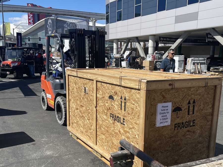 Crate being loaded onto forklift